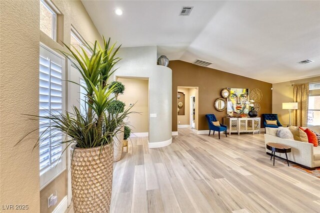 7311 Chaparral Cove Ln, Las Vegas, NV 89131 - sitting room with light wood finished floors and vaulted ceiling