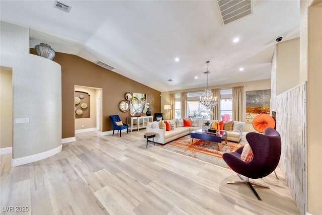 7311 Chaparral Cove Ln, Las Vegas, NV 89131 - living room featuring a chandelier, light wood-style flooring, vaulted ceiling, and recessed lighting