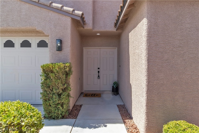 1551 Boundary Peak Way, Las Vegas, NV 89135 - property entrance featuring stucco siding and a garage