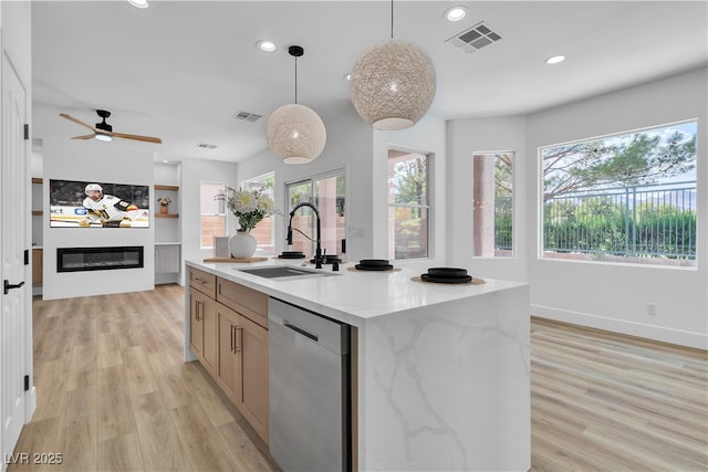 1551 Boundary Peak Way, Las Vegas, NV 89135 - kitchen with dishwasher, plenty of natural light, decorative light fixtures, recessed lighting, and light wood-style flooring