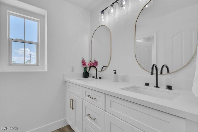 1551 Boundary Peak Way, Las Vegas, NV 89135 - bathroom with double vanity and baseboards