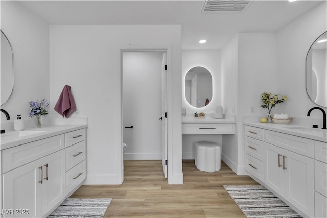 1551 Boundary Peak Way, Las Vegas, NV 89135 - bathroom with wood finished floors, recessed lighting, and two vanities
