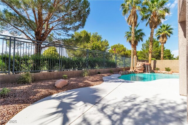 1551 Boundary Peak Way, Las Vegas, NV 89135 - view of swimming pool with a fenced backyard and a patio