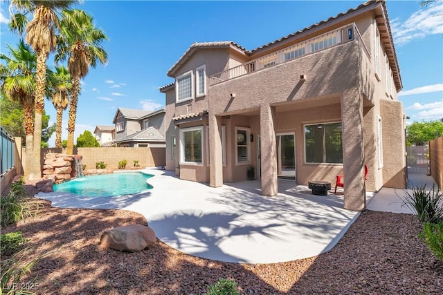 1551 Boundary Peak Way, Las Vegas, NV 89135 - back of house featuring stucco siding, a fenced backyard, a patio area, and a tile roof