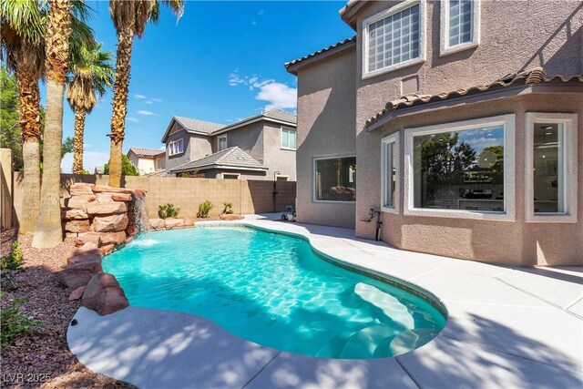 1551 Boundary Peak Way, Las Vegas, NV 89135 - view of swimming pool featuring a fenced backyard and a patio area