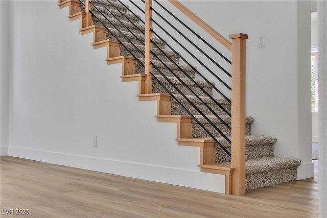 1551 Boundary Peak Way, Las Vegas, NV 89135 - stairs with wood finished floors and baseboards