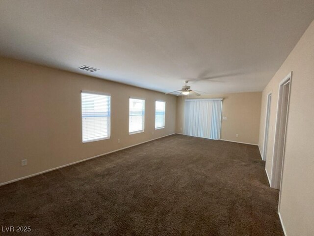 5316 Fireside Ranch Ave, Las Vegas, NV 89131 - spare room featuring dark colored carpet and a ceiling fan