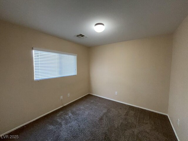 5316 Fireside Ranch Ave, Las Vegas, NV 89131 - empty room with dark carpet and baseboards