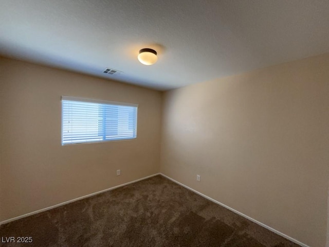 5316 Fireside Ranch Ave, Las Vegas, NV 89131 - empty room with dark carpet and baseboards