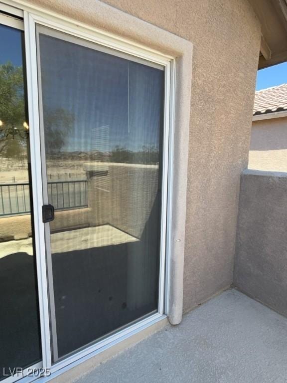 5316 Fireside Ranch Ave, Las Vegas, NV 89131 - property entrance featuring stucco siding