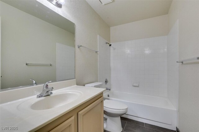 1013 Falconhead Ln Unit 202, Las Vegas, NV 89128 - full bath featuring vanity, tile patterned flooring, and bathtub / shower combination