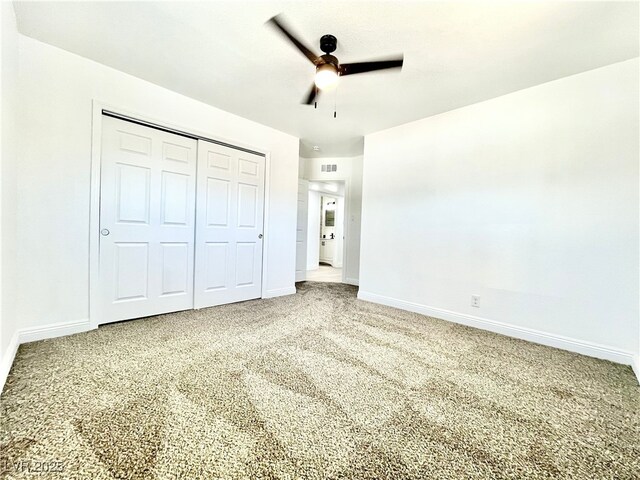 4324 El Conlon Ave, Las Vegas, NV 89102 - unfurnished bedroom featuring a closet, carpet flooring, and ceiling fan