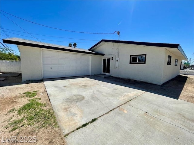 4324 El Conlon Ave, Las Vegas, NV 89102 - ranch-style house with stucco siding, concrete driveway, and a garage