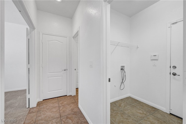 2261 Dalton Ridge Ct, North Las Vegas, NV 89031 - washroom featuring washer hookup and light tile patterned flooring