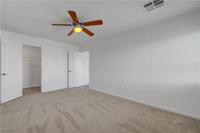2261 Dalton Ridge Ct, North Las Vegas, NV 89031 - unfurnished bedroom with carpet flooring, a spacious closet, a ceiling fan, and a closet