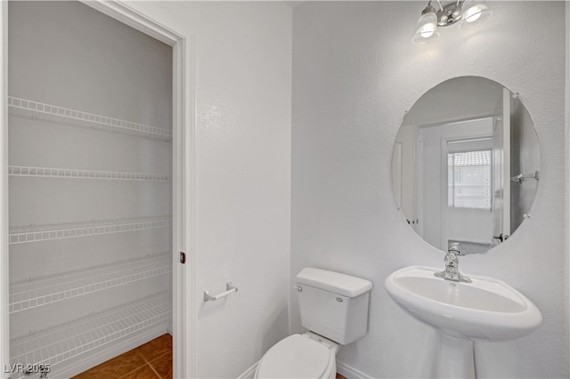 2261 Dalton Ridge Ct, North Las Vegas, NV 89031 - bathroom featuring toilet and tile patterned floors