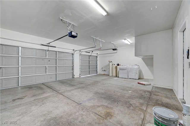 2261 Dalton Ridge Ct, North Las Vegas, NV 89031 - garage with separate washer and dryer and a garage door opener