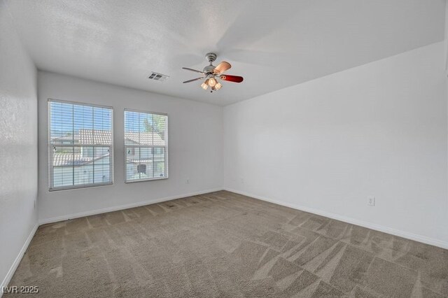 2261 Dalton Ridge Ct, North Las Vegas, NV 89031 - carpeted spare room with a ceiling fan and baseboards