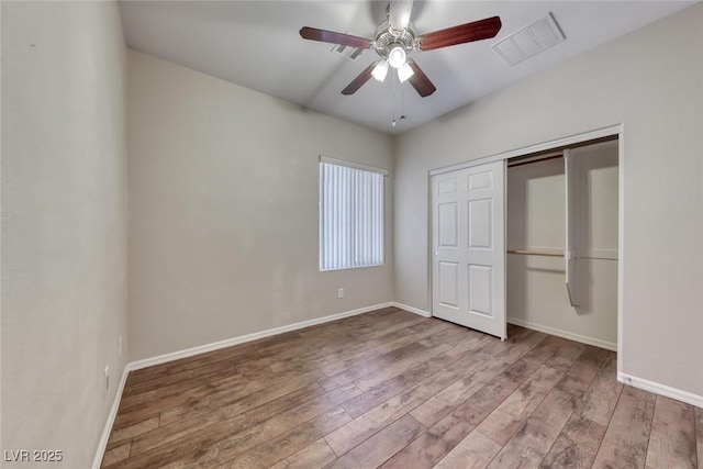 7606 Kenwood Hills Ct, Las Vegas, NV 89131 - unfurnished bedroom with wood-type flooring, a closet, and ceiling fan