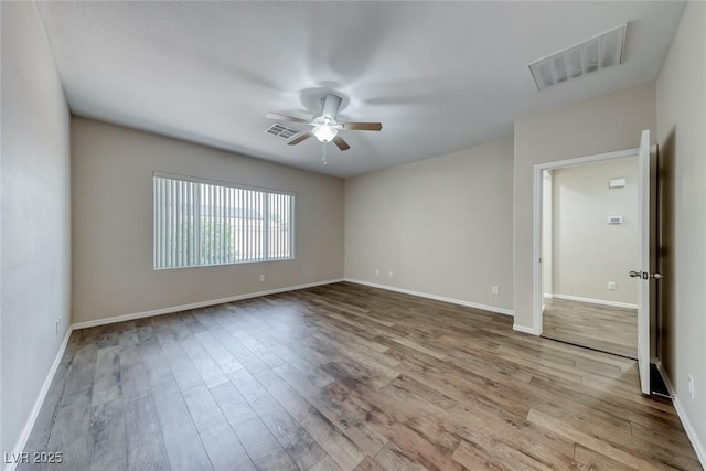 7606 Kenwood Hills Ct, Las Vegas, NV 89131 - spare room featuring a ceiling fan and wood finished floors