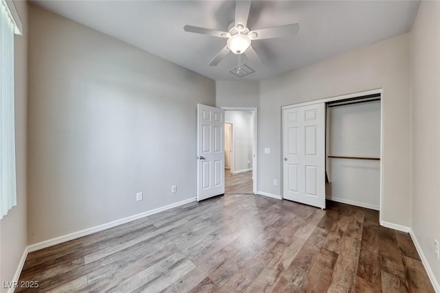 7606 Kenwood Hills Ct, Las Vegas, NV 89131 - unfurnished bedroom featuring wood finished floors, a closet, and ceiling fan