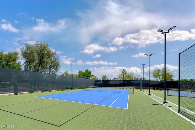 7606 Kenwood Hills Ct, Las Vegas, NV 89131 - view of tennis court featuring community basketball court