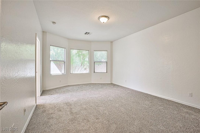 5967 Sun Appello Ave, Las Vegas, NV 89122 - carpeted empty room featuring healthy amount of natural light and a smoke detector