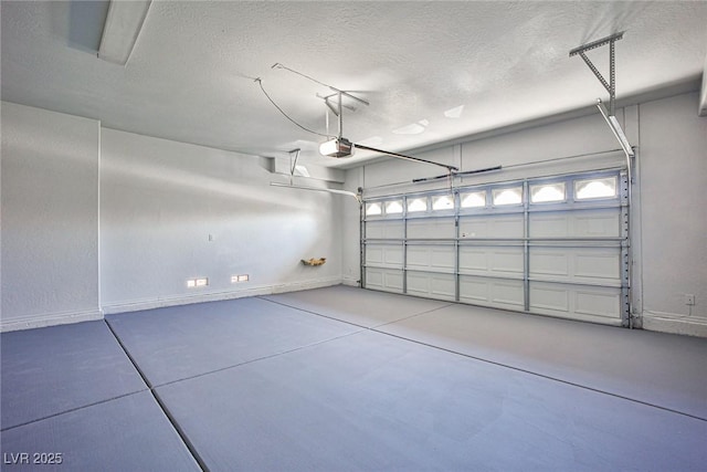 5967 Sun Appello Ave, Las Vegas, NV 89122 - garage featuring a garage door opener and baseboards