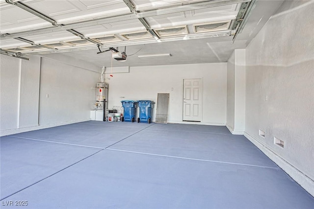 5967 Sun Appello Ave, Las Vegas, NV 89122 - garage featuring a garage door opener and strapped water heater
