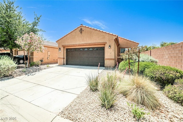 5967 Sun Appello Ave, Las Vegas, NV 89122 - view of front of property featuring stucco siding, concrete driveway, and an attached garage