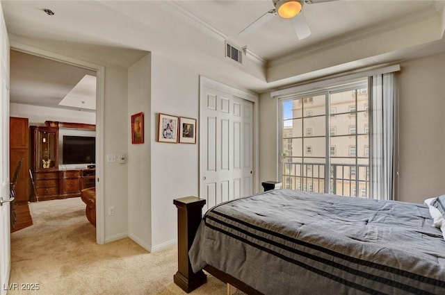 2405 W Serene Ave Unit 612, Las Vegas, NV 89123 - bedroom featuring light carpet, crown molding, a closet, and a ceiling fan
