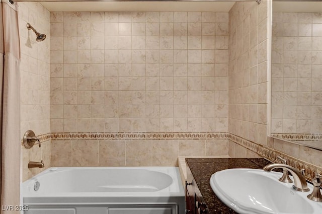 2405 W Serene Ave Unit 612, Las Vegas, NV 89123 - bathroom with tile walls, bathtub / shower combination, and vanity
