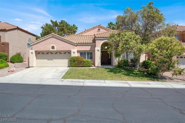 8612 Chiquita Dr, Las Vegas, NV 89128 - mediterranean / spanish-style house with an attached garage, concrete driveway, a front lawn, stucco siding, and a tiled roof