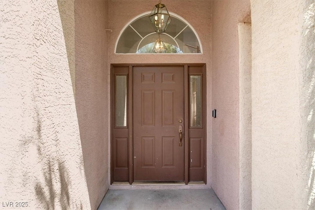 8612 Chiquita Dr, Las Vegas, NV 89128 - view of exterior entry featuring stucco siding