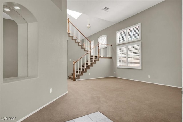 8612 Chiquita Dr, Las Vegas, NV 89128 - carpeted foyer entrance featuring stairway and a skylight