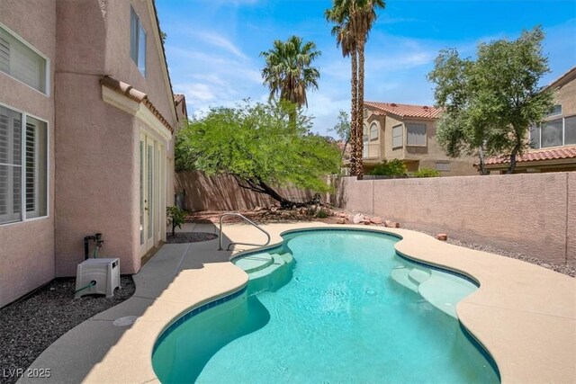 8612 Chiquita Dr, Las Vegas, NV 89128 - view of pool with a fenced backyard and a patio