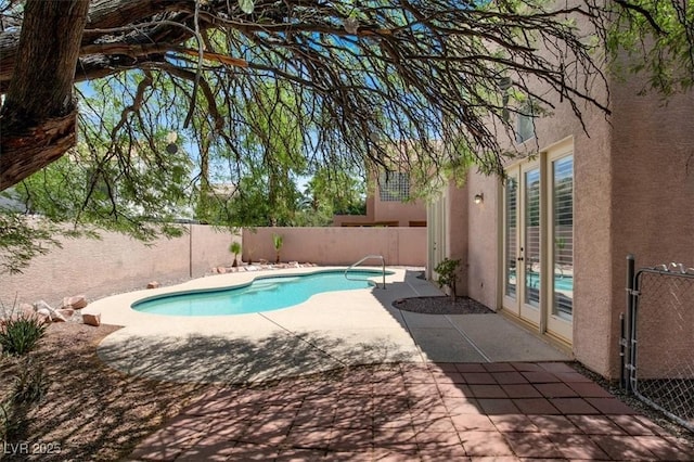 8612 Chiquita Dr, Las Vegas, NV 89128 - view of pool featuring french doors, a fenced backyard, and a patio area