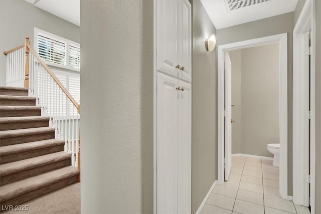 8612 Chiquita Dr, Las Vegas, NV 89128 - hallway with stairway and light tile patterned floors