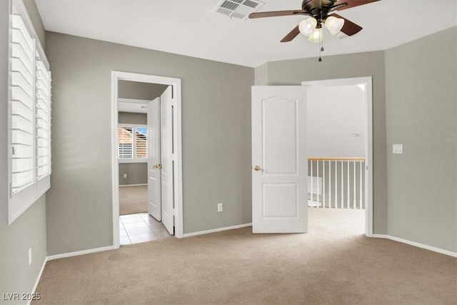 8612 Chiquita Dr, Las Vegas, NV 89128 - unfurnished bedroom featuring carpet floors, tile patterned flooring, and ceiling fan