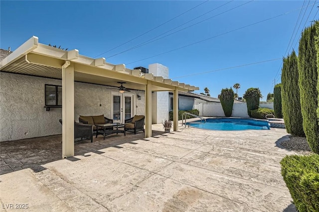 3047 Van Buskirk Cir, Las Vegas, NV 89121 - view of swimming pool featuring ceiling fan, an outdoor hangout area, a patio area, and french doors