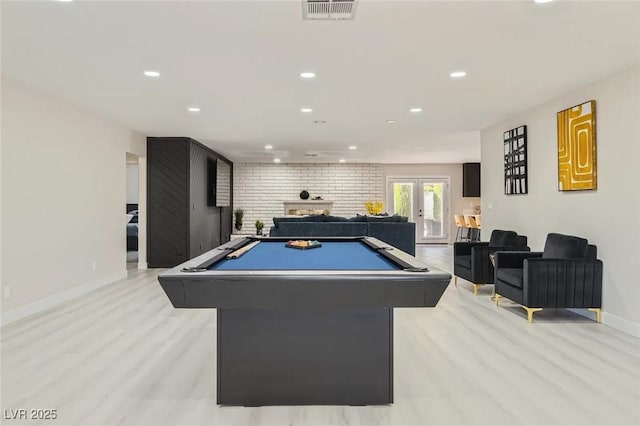 3047 Van Buskirk Cir, Las Vegas, NV 89121 - playroom featuring pool table, recessed lighting, a fireplace, light wood-style flooring, and french doors