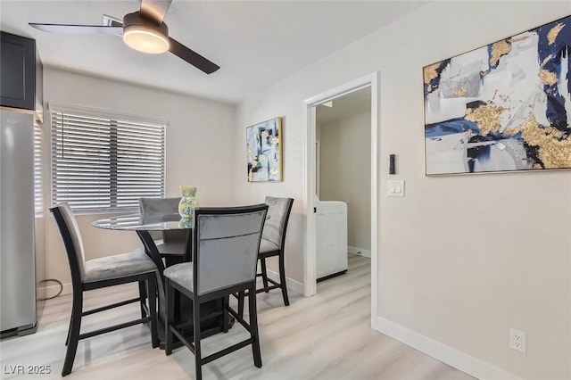 3047 Van Buskirk Cir, Las Vegas, NV 89121 - dining space with a ceiling fan and light wood-style floors