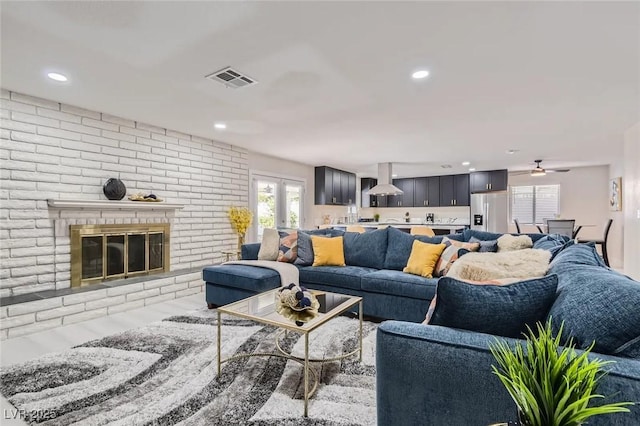 3047 Van Buskirk Cir, Las Vegas, NV 89121 - living area featuring recessed lighting, a fireplace, ceiling fan, and wood finished floors