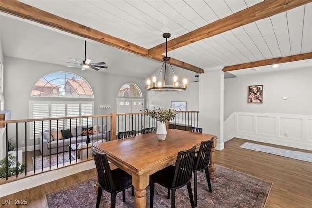 8820 Fall Green Ave, Las Vegas, NV 89129 - dining area featuring beamed ceiling, a chandelier, wood finished floors, a ceiling fan, and wainscoting