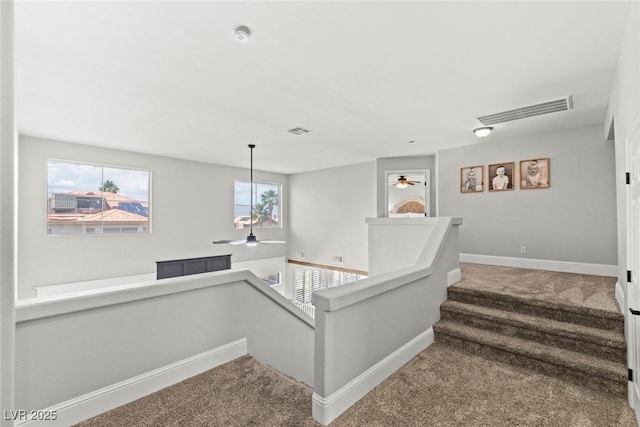 8820 Fall Green Ave, Las Vegas, NV 89129 - stairway featuring carpet and a ceiling fan