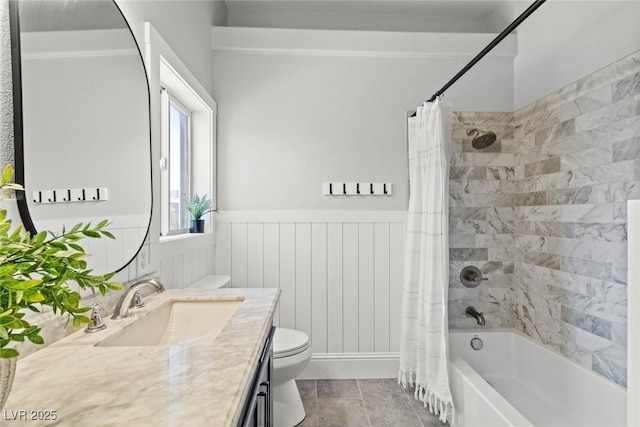 8820 Fall Green Ave, Las Vegas, NV 89129 - full bathroom featuring vanity, shower / tub combo with curtain, and wainscoting