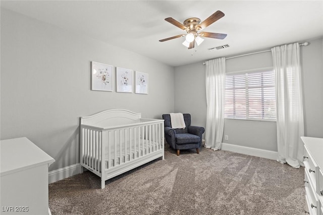 8820 Fall Green Ave, Las Vegas, NV 89129 - bedroom with carpet, a crib, and a ceiling fan