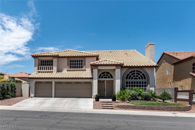 8820 Fall Green Ave, Las Vegas, NV 89129 - mediterranean / spanish home with stucco siding, driveway, a garage, a tiled roof, and a chimney