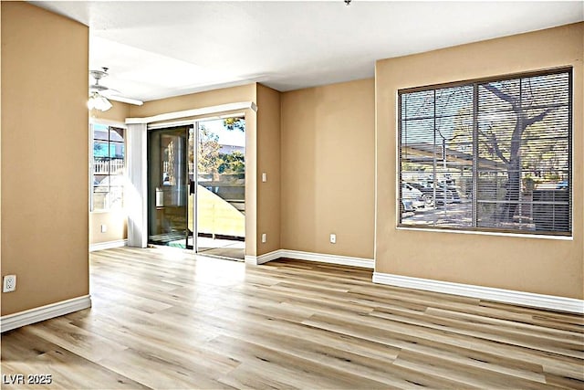 2101 Sealion Dr Unit 108, Las Vegas, NV 89128 - spare room featuring ceiling fan and wood finished floors