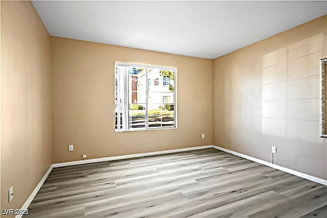 2101 Sealion Dr Unit 108, Las Vegas, NV 89128 - empty room featuring wood finished floors and baseboards